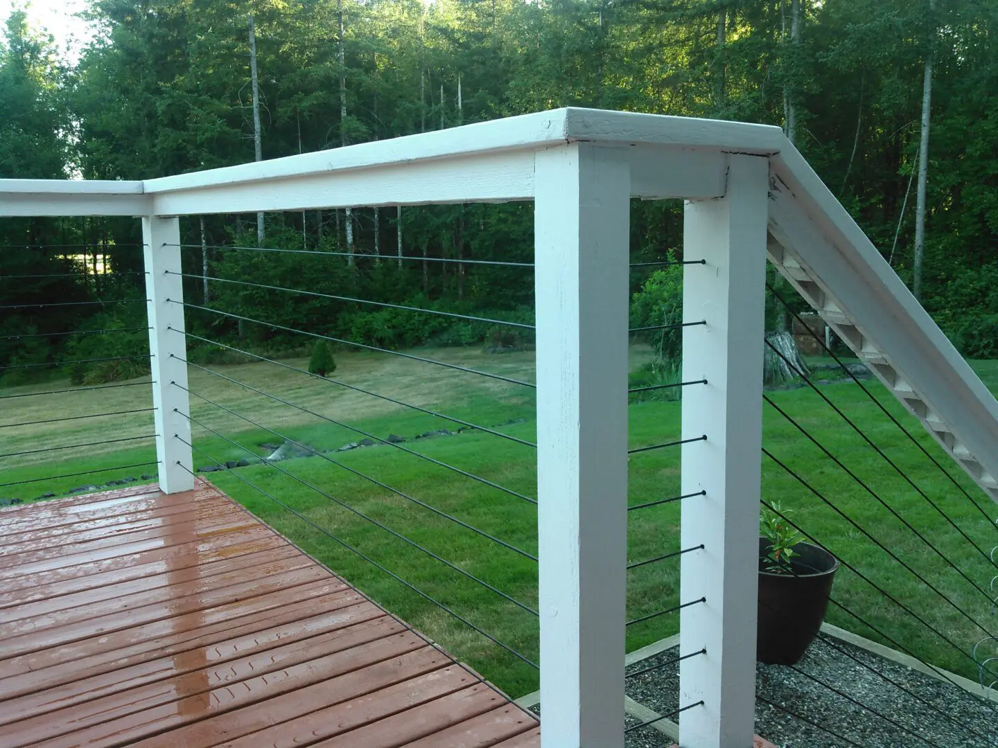 Wooden Patio, Stairs with White Poles and Wires