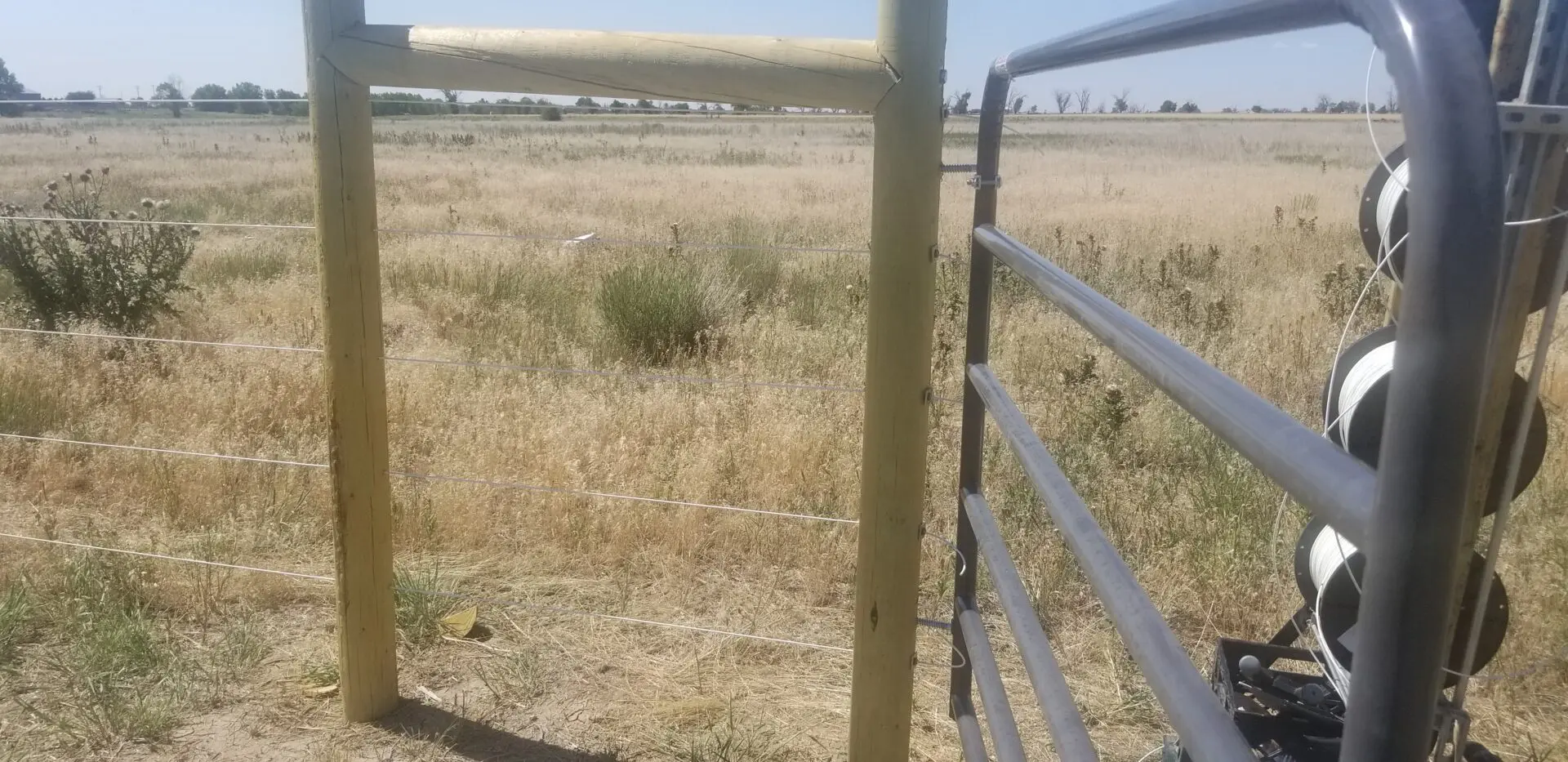 Iron Gate and Wooden Fence, Closeup